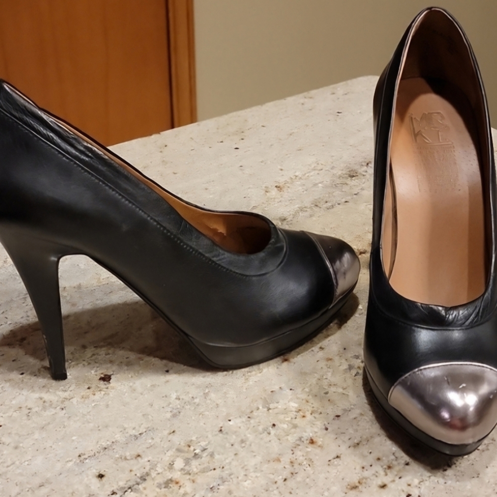 Black silver tipped 4 inch heels.